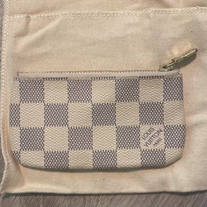 Louis Vuitton Key Pouch, barley used and kept in dust bag!